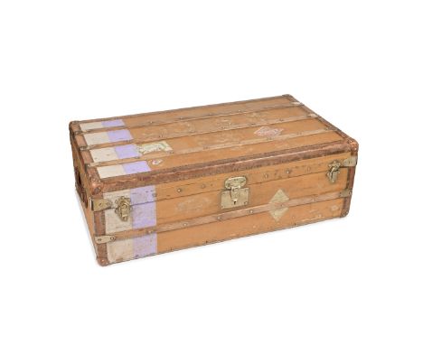 GOYARD: A CANVAS STEAMER TRUNK1890sTwo painted vertical bands to one side, leather carrying handles, wood bound with 'Malles 
