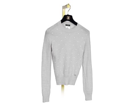 CHANEL: A GREY PEARL JUMPERGrey cashmere and mohair blend studded with simulated pearlsCondition Grade A-Labelled size 36For 