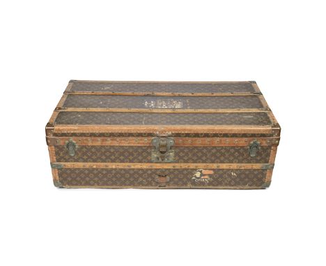 LOUIS VUITTON: A MONOGRAM STEAMER TRUNKc.1926Wood bound monogram canvas trunk with brass fittings, painted white square and l