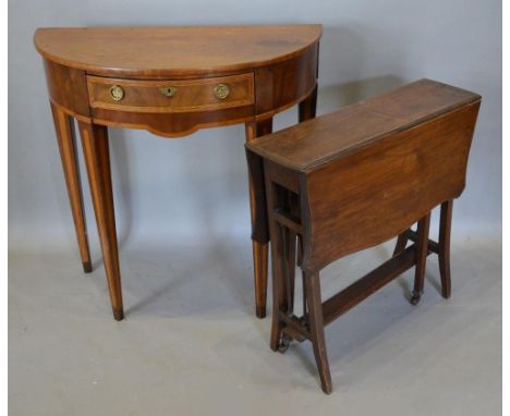 A 19th Century Mahogany Demi-Lune Side Table with a frieze drawer raised upon square tapering legs together with a Victorian 
