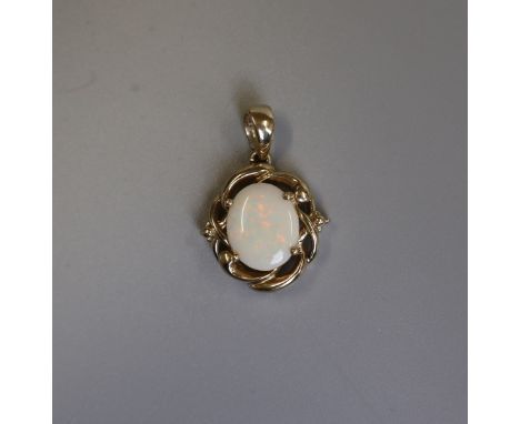 Gold opal pendant 