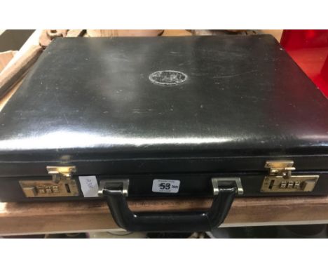 BLACK BRIEF CASE CONTAINING A WOOD BOXED PLAYING CARD DICE SET &amp; LEAD MOULDING
