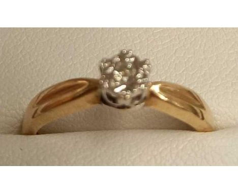 A SINGLE STONE DIAMOND RING SET IN GOLD