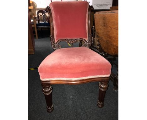 MAHOGANY CARVED DINING CHAIR ON PILLAR LEGS WITH PINK CUSHIONS