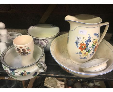 SHELF OF CHINAWARE INCL; CHAMBER POTS, JUG &amp; BASIN WASH SET &amp; OTHER CHINAWARE
