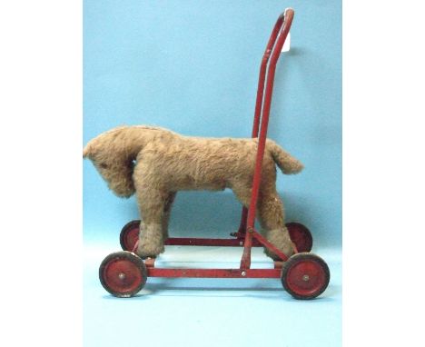 A Chiltern push-along toy, with label.