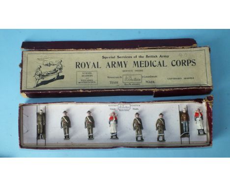 Britains Set 1723 Royal Army Medical Corps (Service dress with tin hats), four stretcher bearers, two khaki stretchers and wo