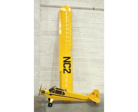 A Piper Cub scale-model remote-control aeroplane with propeller and engine, 128cm long, 212cm wing span. 