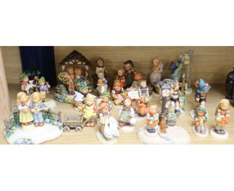 A collection of Hummel figures tallest 18cm