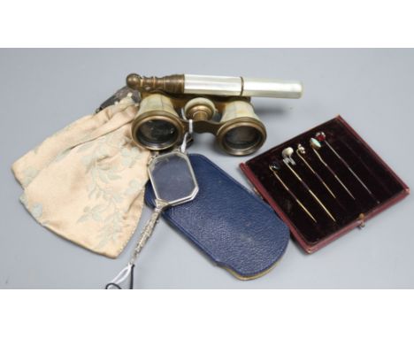 Six stick pins, various, a pair of mother of pearl opera glasses with telescopic handle and two other items, including a clot