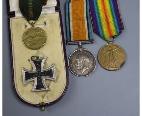 A WWI war medal and Victory to 23988 Private F. Newham, C. of LRS, and 8th Army Naples medallion, a German cross and a Milita