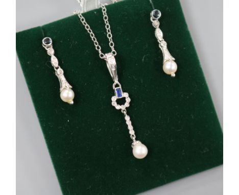 A modern suite of 9ct white gold, sapphire, diamond and cultured pearl jewellery, comprising earrings and pendant necklace.