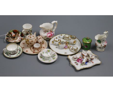 A group of miniature china including teasets, cup and saucers, jugs, etc.