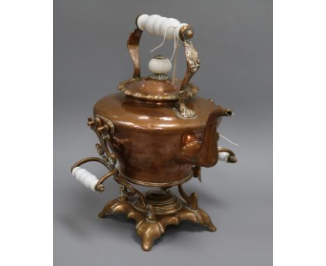 A Victorian copper kettle on stand, fitted ceramic handles overall 38cm