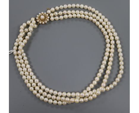 A three-row cultured pearl necklace fitted 9ct gold and pearl clasp, approx. 44cm.