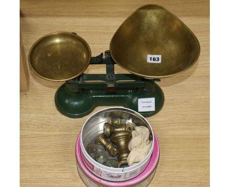 A set of Victorian cast iron scales, with brass pans