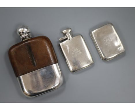 A small silver hip flask, a leather and plate-mounted hip flask and a silver cigarette case