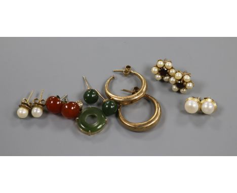 A pair of 9ct gold creole earrings, five other pairs of earrings and a jade pendant