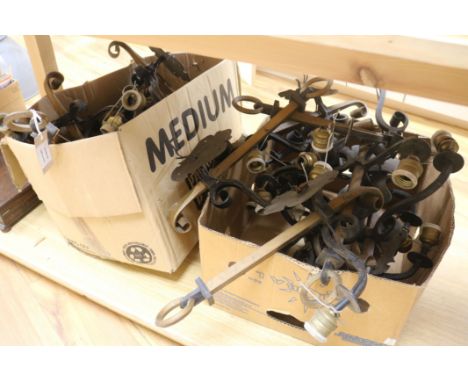 A quantity of iron and bronze wall lights