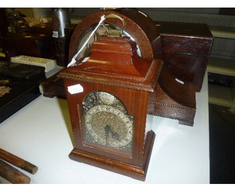 A MANTLE CLOCK