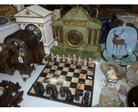 AN ALABASTER MANTLE CLOCK, (pendulum) and a part chess set (2)