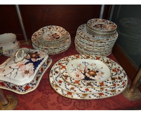 A DERBY PART DINNER SERVICE, first half of the 19th Century, decorated in the Imari pallet of a flowering tree (over 30 piece