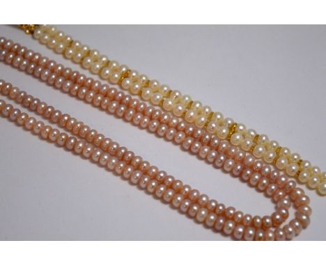 TWO ITEMS OF JEWELLERY, the first a pearl bracelet designed as a double row of pearls with gold coloured spacers to the oval 