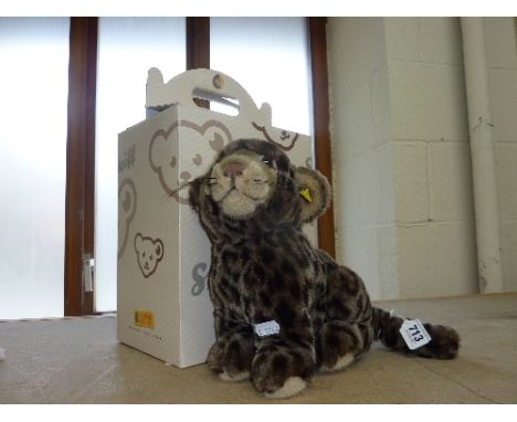 A BOXED STEIFF PLUSH LEOPARD, height approximately 25cm