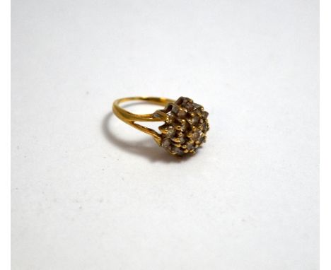 A DIAMOND CLUSTER RING, with brilliant cut diamonds of daisy shape design, estimated total diamond weight 0.40ct, ring size H