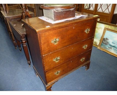 A 19TH CENTURY MAHOGANY SECRETAIRE CHEST, of three long drawers (later bracket feet etc)