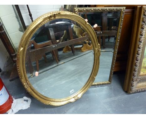 TWO GILT FRAMED WALL MIRRORS, a brass and onyx standard lamp and a similar table lamp (4)