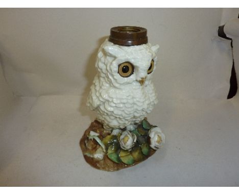 A 19TH CENTURY NOVELTY PORCELAIN LAMP BASE, shaped as an Owl, with glass eyes, height approximately 17cm (s.d.)