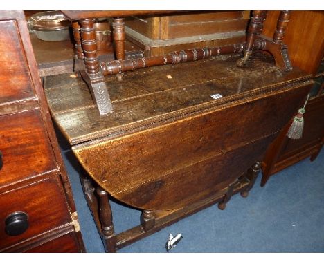 AN 18TH CENTURY AND LATER OAK GATE LEG TABLE, (s.d.)