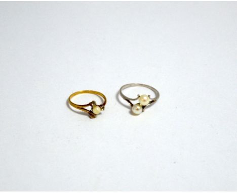 TWO 9CT GOLD PEARL RINGS, the first a double pearl ring together with a single pearl and paste ring, ring sizes O 1/2 and L