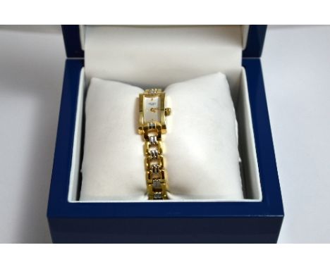 A LADIES ROTARY WATCH, with bi metal coloured strap