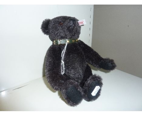 AN UNBOXED LIMITED EDITION STEIFF BLACK ALPACA BEAR, 23 of 2007, height approximately 24cm