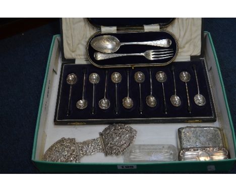 A COLLECTION OF SILVER ITEMS, to include boxed cutlery, a belt buckle, a cigarette case and a cut glass and silver trinket bo