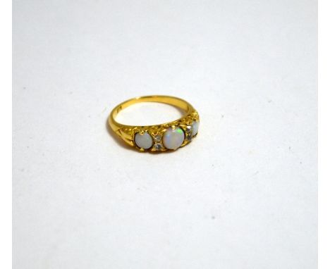 AN OPAL AND DIAMOND RING, with three graduated opals and old cut diamond accents between the opals, stamped 18, ring size Q