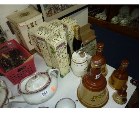 A SET OF FOUR WADE WHISKY BELLS, (three boxed), four boxed bottles of Ale and Crown Devon 'Gin' decanter (9)