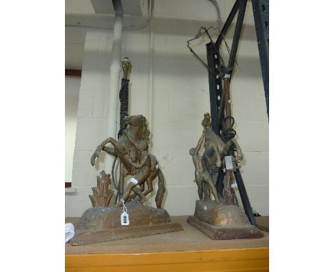 A PAIR OF CAST LAMP BASES, depicting horse and handler (2)