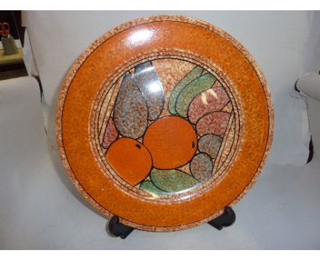 A CLARICE CLIFF FOR WILKINSON & CO PLATE, 'Oranges Cafe-au-Lait', Bizarre pattern, diameter approximately 25cm (chip to base)