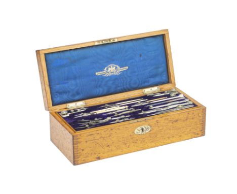 A Fine Magazine Case of Drawing Instruments by Stanley, English, c.1890, substantial oak case, the lid lined with watered sil