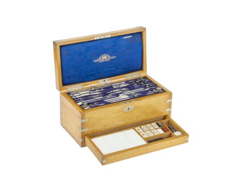 A Stanley Magazine Case of Drawing Instruments, English, c.1880, a large, comprhensive nickel silver set in blond oak case, t