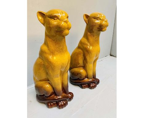 CERAMIC PANTHERS, a pair, 60cm high, 20cm wide, 27cm deep. (2) 