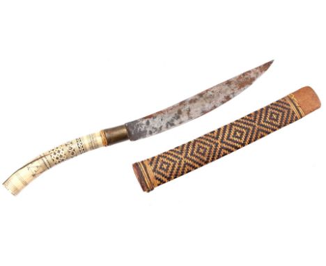 Dagger with bone carved handle, wooden scabbard covered with reed and metal blade, Asia ca. 1900, 43 cm long