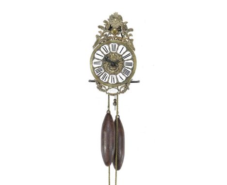 Iron lantern clock with enamel cartouches with Roman numerals, richly decorated brass dial, Louis XIV cup in the center and e