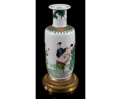 Porcelain Famille Verte vase with man and woman eating at the table with a man next to them who provides entertainment, conve