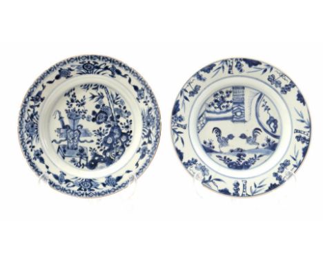 Porcelain dish with blue white decor of 2 roosters in garden, China Kangxi period, 23 cm diameter (hairline and chips) and po