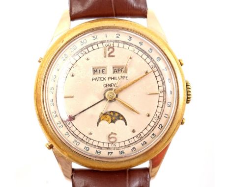 Patek Philippe men's wristwatch on a leather strap. The watch has been checked, glass and ring are not original. Case size is