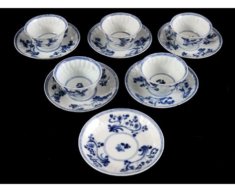 5 porcelain cups and 6 saucers with blue and white floral decor, 'linzhi' mark in bottom, China Kangxi period (chips and hair